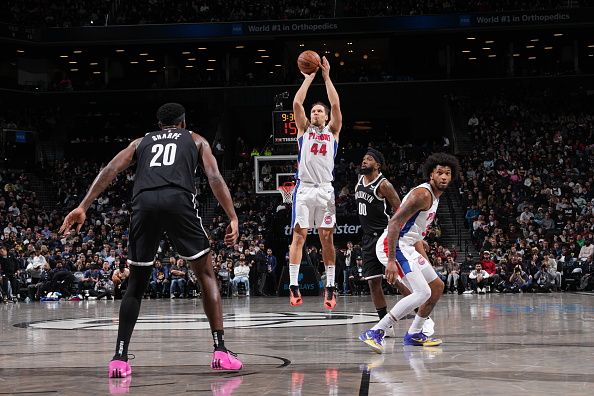 BROOKLYN, NY - DECEMBER 23: Bojan Bogdanovic #44 of the Detroit Pistons shoots a three point basket against the Brooklyn Nets on December 23, 2023 at Barclays Center in Brooklyn, New York. NOTE TO USER: User expressly acknowledges and agrees that, by downloading and or using this Photograph, user is consenting to the terms and conditions of the Getty Images License Agreement. Mandatory Copyright Notice: Copyright 2023 NBAE (Photo by Jesse D. Garrabrant/NBAE via Getty Images)