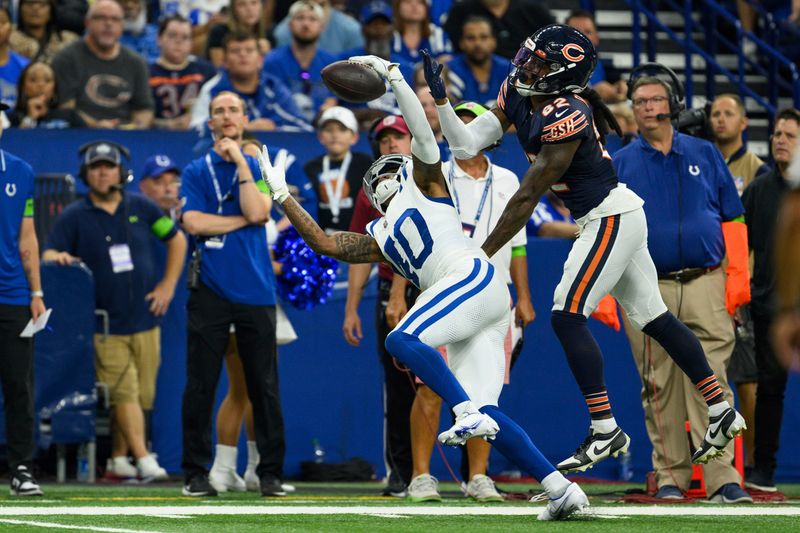 Indianapolis Colts cornerback Jaylon Jones (40) breaks up a pass for Chicago Bears wide receiver Daurice Fountain (82) during an NFL football game, Saturday, Aug. 19, 2023, in Indianapolis. (AP Photo/Zach Bolinger)