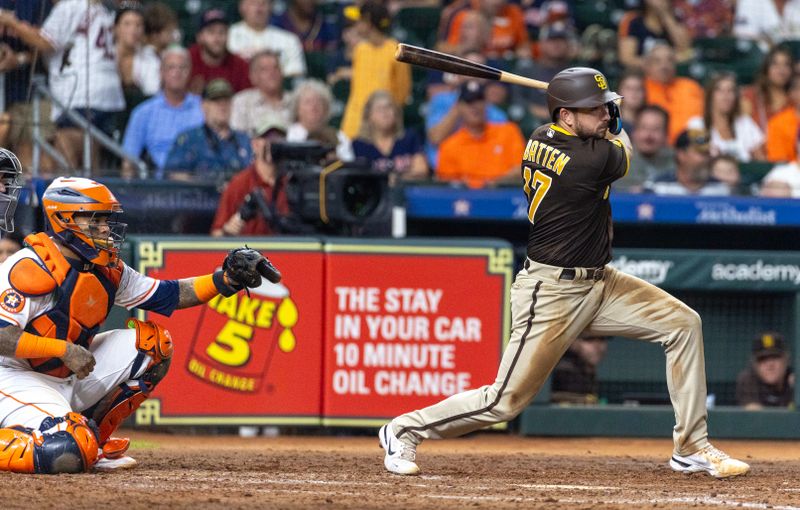 Sep 9, 2023; Houston, Texas, USA; San Diego Padres third baseman Matthew Batten (17) hits a RBI single against the Houston Astros in the sixth inning at Minute Maid Park. Mandatory Credit: Thomas Shea-USA TODAY Sports