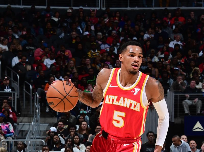 ATLANTA, GA - MARCH 10: Dejounte Murray #5 of the Atlanta Hawks dribbles the ball during the game against the New Orleans Pelicans  on March 10, 2024 at State Farm Arena in Atlanta, Georgia.  NOTE TO USER: User expressly acknowledges and agrees that, by downloading and/or using this Photograph, user is consenting to the terms and conditions of the Getty Images License Agreement. Mandatory Copyright Notice: Copyright 2024 NBAE (Photo by Scott Cunningham/NBAE via Getty Images)