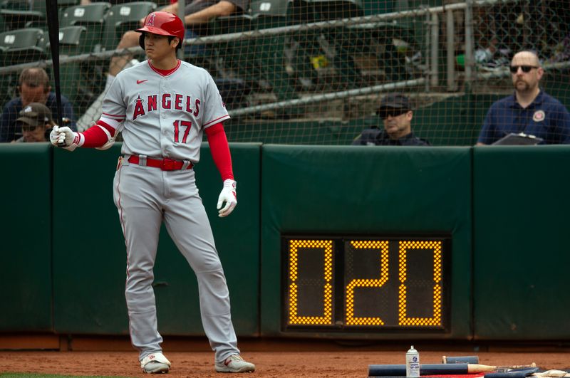 Sep 2, 2023; Oakland, California, USA; Los Angeles Angels designated hitter Shohei Ohtani (17) waits for his turn at bat against the Oakland Athletics during the second inning at Oakland-Alameda County Coliseum. Mandatory Credit: D. Ross Cameron-USA TODAY Sports