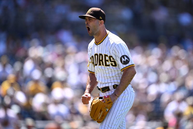 Jul 26, 2023; San Diego, California, USA; San Diego Padres relief pitcher Nick Martinez (21) reacts after the last out of the top of the eighth inning was recorded against the Pittsburgh Pirates at Petco Park. Mandatory Credit: Orlando Ramirez-USA TODAY Sports