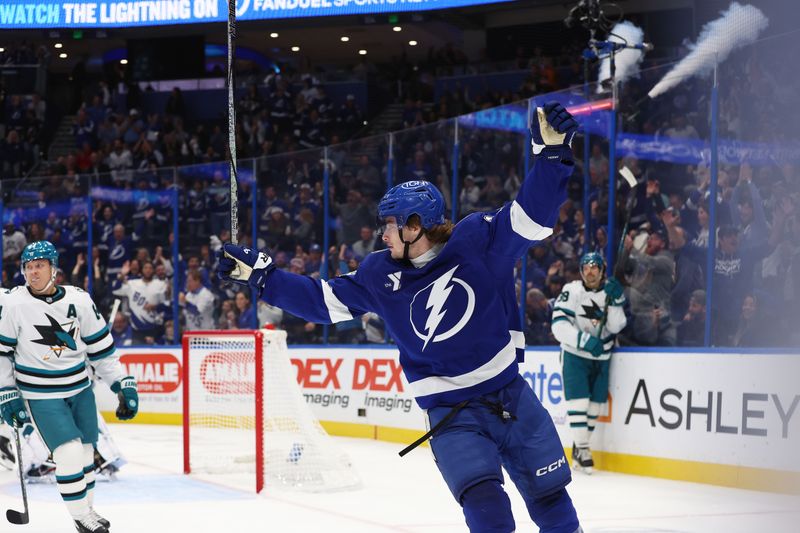 Dec 5, 2024; Tampa, Florida, USA; Tampa Bay Lightning center Conor Geekie (14) celebrates after he scored against the San Jose Sharks during the first period at Amalie Arena. Mandatory Credit: Kim Klement Neitzel-Imagn Images