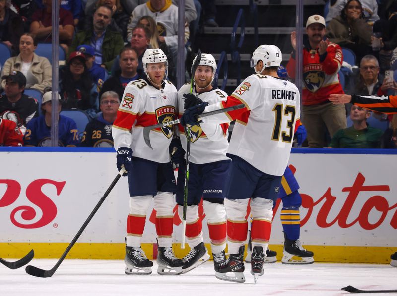 Oct 12, 2024; Buffalo, New York, USA;  Florida Panthers center Sam Bennett (9) celebrates his goal with teammates during the second period against the Buffalo Sabres at KeyBank Center. Mandatory Credit: Timothy T. Ludwig-Imagn Images