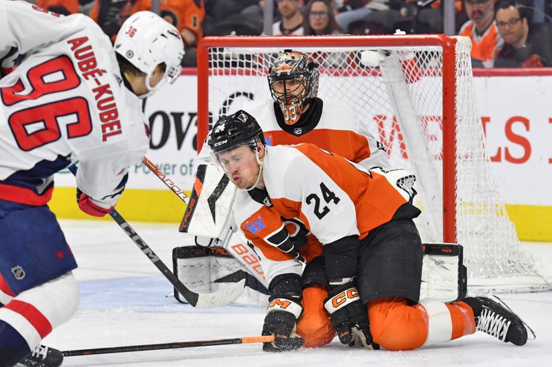 Apr 16, 2024; Philadelphia, Pennsylvania, USA; Philadelphia Flyers defenseman Nick Seeler (24) block a shot by Washington Capitals right wing Nicolas Aube-Kubel (96) during the third period at Wells Fargo Center. Mandatory Credit: Eric Hartline-USA TODAY Sports