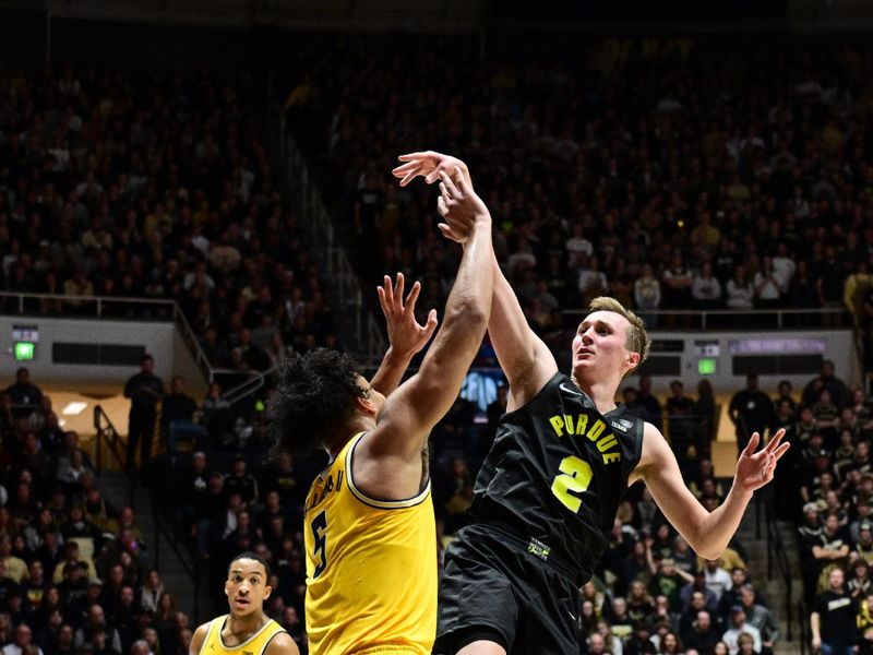 Jan 23, 2024; West Lafayette, Indiana, USA; Purdue Boilermakers guard Fletcher Loyer (2) shoots the ball over Michigan Wolverines forward Terrance Williams II (5) during the second half at Mackey Arena. Mandatory Credit: Marc Lebryk-USA TODAY Sports