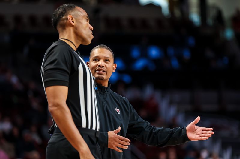 Feb 4, 2023; Columbia, South Carolina, USA; South Carolina Gamecocks head coach Lamont Paris disputes a call against the Arkansas Razorbacks in the first half at Colonial Life Arena. Mandatory Credit: Jeff Blake-USA TODAY Sports