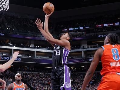 SACRAMENTO, CA - DECEMBER 14: Keegan Murray #13 of the Sacramento Kings shoots the ball during the game against the Oklahoma City Thunder on December 14, 2023 at Golden 1 Center in Sacramento, California. NOTE TO USER: User expressly acknowledges and agrees that, by downloading and or using this Photograph, user is consenting to the terms and conditions of the Getty Images License Agreement. Mandatory Copyright Notice: Copyright 2023 NBAE (Photo by Rocky Widner/NBAE via Getty Images)