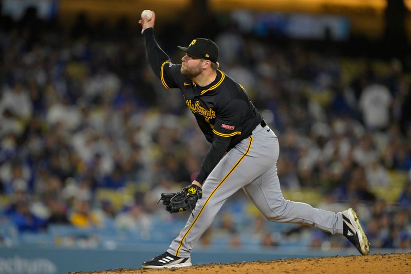 Apr 25, 2025; Los Angeles, California, USA;  Pittsburgh Pirates relief pitcher David Bednar (51) earns a save in the ninth inning against the Los Angeles Dodgers at Dodger Stadium. Mandatory Credit: Jayne Kamin-Oncea-Imagn Images