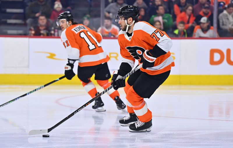 Jan 22, 2023; Philadelphia, Pennsylvania, USA; Philadelphia Flyers defenseman Tony DeAngelo (77) controls the puck against the Winnipeg Jets in the first period at Wells Fargo Center. Mandatory Credit: Kyle Ross-USA TODAY Sports