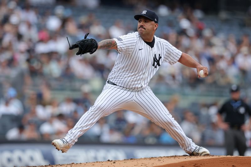 Jul 20, 2024; Bronx, New York, USA; New York Yankees starting pitcher Nestor Cortes (65) pitches against the Tampa Bay Rays during the second inning at Yankee Stadium. Mandatory Credit: Brad Penner-USA TODAY Sports