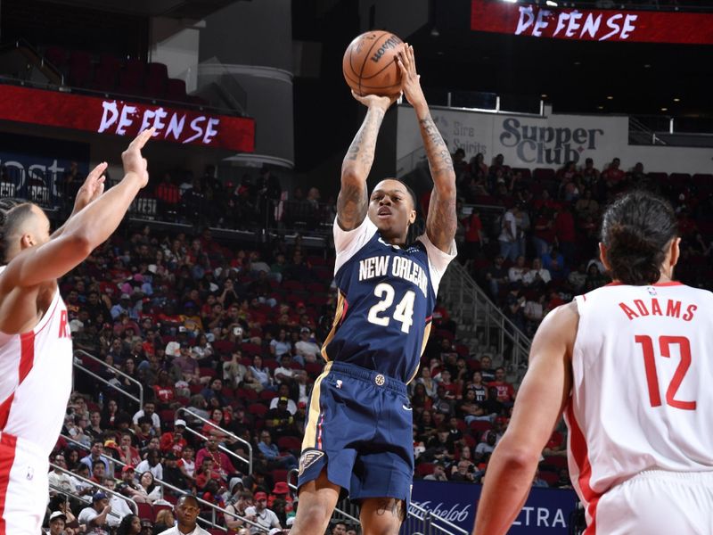 HOUSTON, TX - OCTOBER 15: Jordan Hawkins #24 of the New Orleans Pelicans shoots the ball during the game against the Houston Rockets during a NBA preseason game on October 15, 2024 at the Toyota Center in Houston, Texas. NOTE TO USER: User expressly acknowledges and agrees that, by downloading and or using this photograph, User is consenting to the terms and conditions of the Getty Images License Agreement. Mandatory Copyright Notice: Copyright 2024 NBAE (Photo by Logan Riely/NBAE via Getty Images)