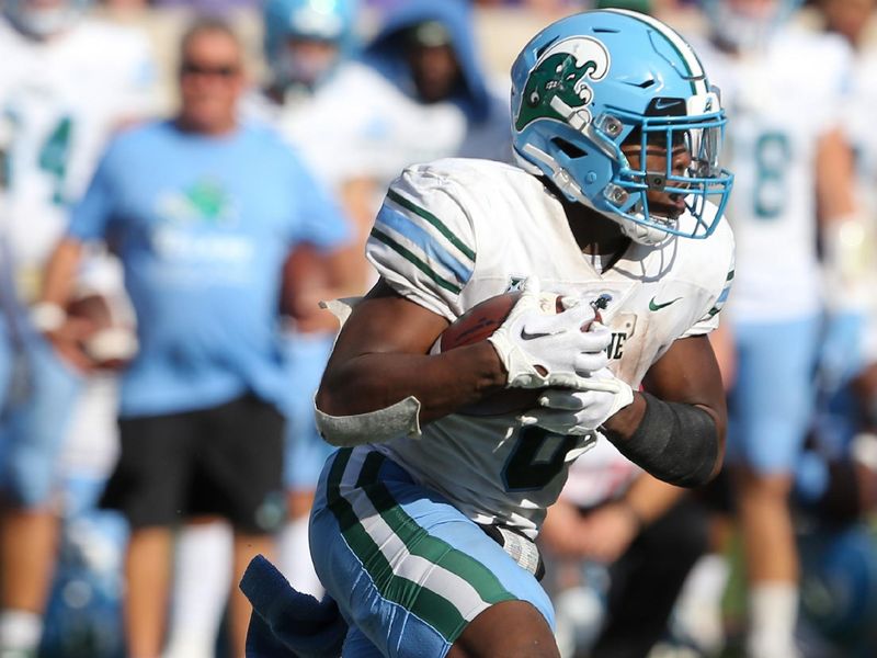 Sep 17, 2022; Manhattan, Kansas, USA; Tulane Green Wave running back Iverson Celestine (8) carries the ball during the fourth quarter against the Kansas State Wildcats at Bill Snyder Family Football Stadium. Mandatory Credit: Scott Sewell-USA TODAY Sports