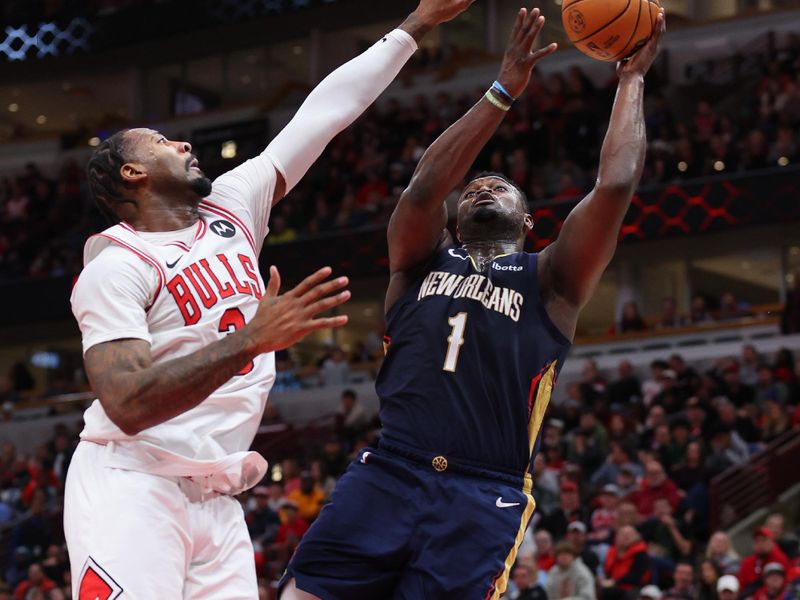 CHICAGO, ILLINOIS - DECEMBER 02: Zion Williamson #1 of the New Orleans Pelicans goes up for a layup against Andre Drummond #3 of the Chicago Bulls during the second half at the United Center on December 02, 2023 in Chicago, Illinois. NOTE TO USER: User expressly acknowledges and agrees that, by downloading and or using this photograph, User is consenting to the terms and conditions of the Getty Images License Agreement.  (Photo by Michael Reaves/Getty Images)