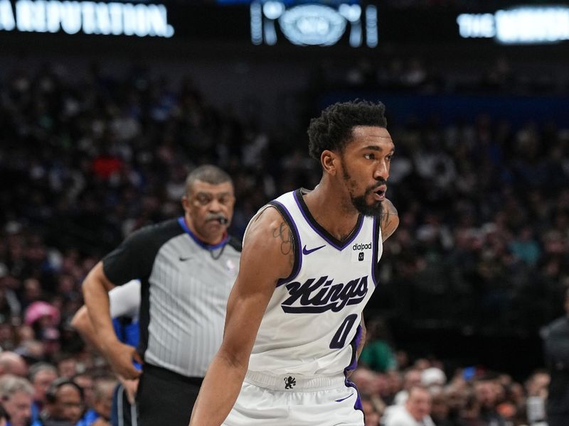 DALLAS, TX - JANUARY 27: Malik Monk #0 of the Sacramento Kings goes to the basket during the game  on January 27, 2024 at the American Airlines Center in Dallas, Texas. NOTE TO USER: User expressly acknowledges and agrees that, by downloading and or using this photograph, User is consenting to the terms and conditions of the Getty Images License Agreement. Mandatory Copyright Notice: Copyright 2024 NBAE (Photo by Glenn James/NBAE via Getty Images)