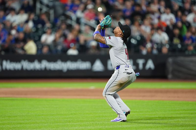 May 31, 2024; New York City, New York, USA; Arizona Diamondbacks second baseman Ketel Marte (4) catches an infield fly ball hit by New York Mets center fielder Harrison Bader (not pictured) during the fourth inning at Citi Field. Mandatory Credit: Gregory Fisher-USA TODAY Sports