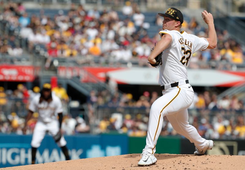 May 25, 2024; Pittsburgh, Pennsylvania, USA;  Pittsburgh Pirates starting pitcher Mitch Keller (23) delivers a pitch against the Atlanta Braves during the first inning at PNC Park. Mandatory Credit: Charles LeClaire-USA TODAY Sports