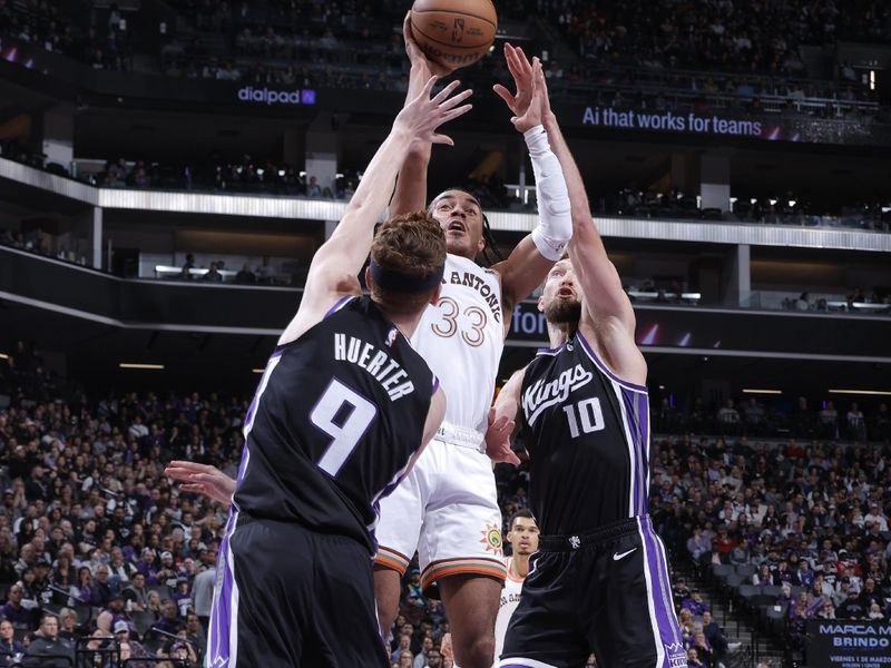 SACRAMENTO, CA - FEBRUARY 22: Tre Jones #33 of the San Antonio Spurs drives to the basket during the game against the Sacramento Kings on February 22, 2024 at Golden 1 Center in Sacramento, California. NOTE TO USER: User expressly acknowledges and agrees that, by downloading and or using this Photograph, user is consenting to the terms and conditions of the Getty Images License Agreement. Mandatory Copyright Notice: Copyright 2023 NBAE (Photo by Rocky Widner/NBAE via Getty Images)