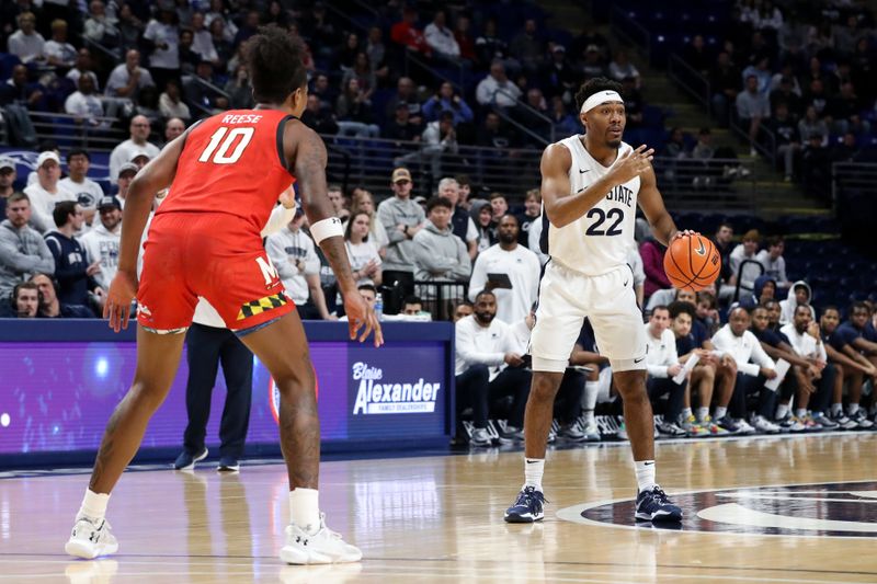 Mar 5, 2023; University Park, Pennsylvania, USA; Penn State Nittany Lions guard Jalen Pickett (22) gestures while dribbling the ball as Maryland Terrapins forward Julian Reese (10) defends during the first half at Bryce Jordan Center. Mandatory Credit: Matthew OHaren-USA TODAY Sports