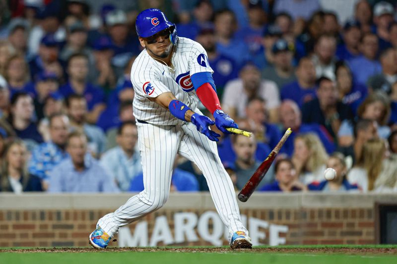 Sep 17, 2024; Chicago, Illinois, USA; Chicago Cubs third baseman Isaac Paredes (17) grounds into a force out against the Oakland Athletics during the third inning at Wrigley Field. Mandatory Credit: Kamil Krzaczynski-Imagn Images