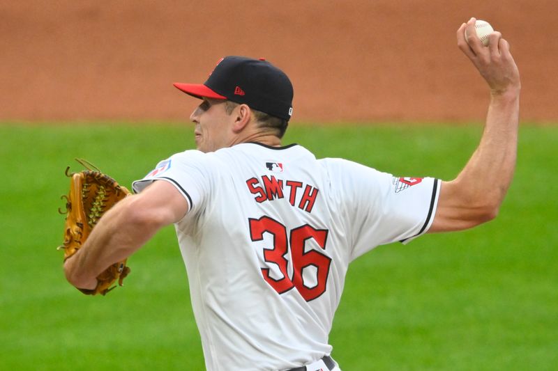 May 20, 2024; Cleveland, Ohio, USA; Cleveland Guardians relief pitcher Cade Smith (36) delivers a pitch in the eighth inning against the New York Mets at Progressive Field. Mandatory Credit: David Richard-USA TODAY Sports