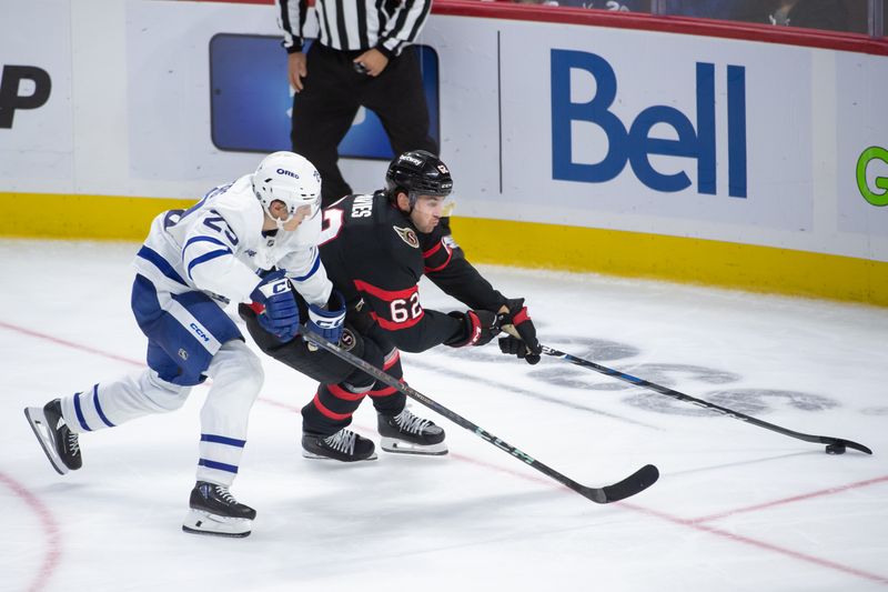 Sep 24, 2024; Ottawa, Ontario, CAN; Toronto Maple Leafs right wing Pontus Holmberg chases Ottawa Senators defenseman Jeremy Davies (62) who controls the puck in the third period at the Canadian Tire Centre. Mandatory Credit: Marc DesRosiers-Imagn Images