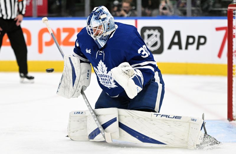 Sep 28, 2022; Toronto, Ontario, CAN; Toronto Maple Leafs goalie Matt Murray (30) makes a save against the Montreal Canadiens in the first period at Scotiabank Arena. Mandatory Credit: Dan Hamilton-USA TODAY Sports