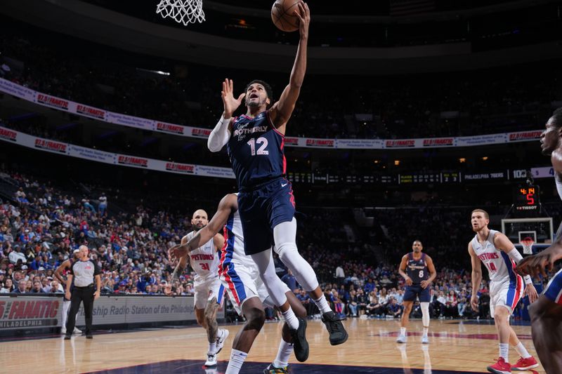 PHILADELPHIA, PA - APRIL 9: Tobias Harris #12 of the Philadelphia 76ers drives to the basket during the game against the Detroit Pistons on April 9, 2024 at the Wells Fargo Center in Philadelphia, Pennsylvania NOTE TO USER: User expressly acknowledges and agrees that, by downloading and/or using this Photograph, user is consenting to the terms and conditions of the Getty Images License Agreement. Mandatory Copyright Notice: Copyright 2024 NBAE (Photo by Jesse D. Garrabrant/NBAE via Getty Images)