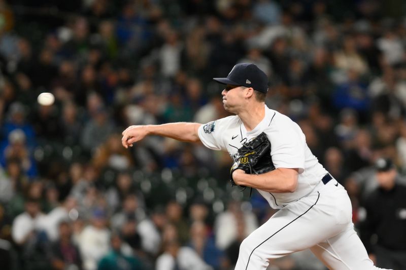 Sep 11, 2023; Seattle, Washington, USA; Seattle Mariners relief pitcher Justin Topa (48) pitches to the Los Angeles Angels during the tenth inning at T-Mobile Park. Mandatory Credit: Steven Bisig-USA TODAY Sports