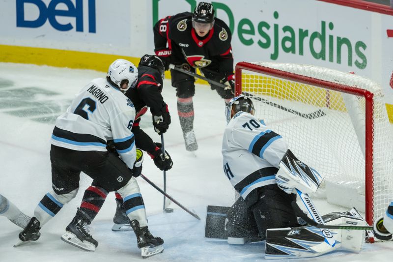 Jan 26, 2025; Ottawa, Ontario, CAN; Ottawa Senators left wing Brady Tkachuk (7) shoots on Utah goalie Karel Vejmelka (70) in the third period at the Canadian Tire Centre. Mandatory Credit: Marc DesRosiers-Imagn Images