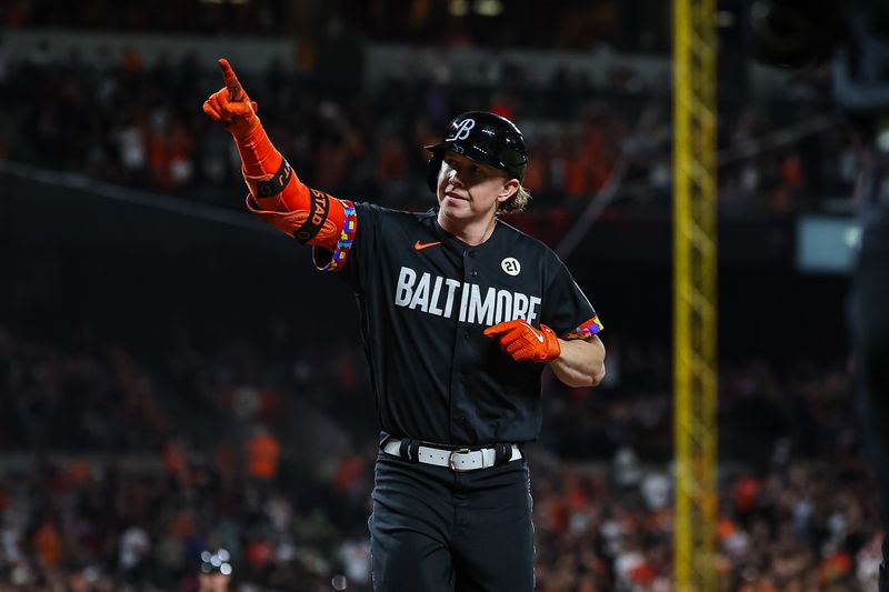 Sep 15, 2023; Baltimore, Maryland, USA; Baltimore Orioles right fielder Heston Kjerstad (13) reacts after hitting a one run home run against the Tampa Bay Rays for his first major league hit during the sixth inning at Oriole Park at Camden Yards. Mandatory Credit: Scott Taetsch-USA TODAY Sports