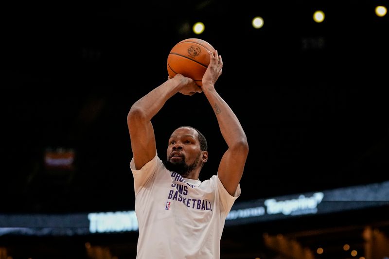 TORONTO, ON - NOVEMBER 29: Kevin Durant #35 of the Phoenix Suns warms up before facing the Toronto Raptors at the Scotiabank Arena on November 29, 2023 in Toronto, Ontario, Canada. NOTE TO USER: User expressly acknowledges and agrees that, by downloading and/or using this Photograph, user is consenting to the terms and conditions of the Getty Images License Agreement. (Photo by Andrew Lahodynskyj/Getty Images)