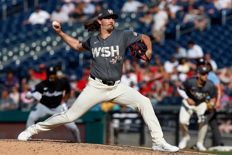 Jun 15, 2024; Washington, District of Columbia, USA; Washington Nationals pitcher Hunter Harvey (73) pitches against the Miami Marlins during the eighth inning  at Nationals Park. Mandatory Credit: Geoff Burke-USA TODAY Sports