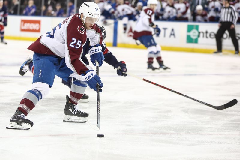 Jan 26, 2025; New York, New York, USA;  Colorado Avalanche right wing Logan O'Connor (25) controls the puck in the third period against the New York Rangers at Madison Square Garden. Mandatory Credit: Wendell Cruz-Imagn Images