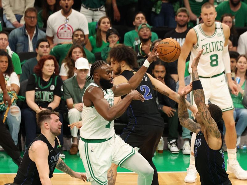 BOSTON, MA - JUNE 6: Jaylen Brown #7 of the Boston Celtics passes the ball during the game against the Dallas Mavericks during Game One of the 2024 NBA Finals on June 6, 2024 at the TD Garden in Boston, Massachusetts. NOTE TO USER: User expressly acknowledges and agrees that, by downloading and or using this photograph, User is consenting to the terms and conditions of the Getty Images License Agreement. Mandatory Copyright Notice: Copyright 2024 NBAE  (Photo by Lauren Leigh Bacho/NBAE via Getty Images)