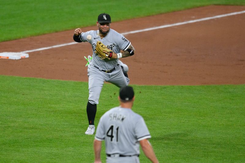 Aug 29, 2023; Baltimore, Maryland, USA; Chicago White Sox third baseman Yoan Moncada (10) drops the ball during the eighth inning against the Baltimore Orioles at Oriole Park at Camden Yards. Mandatory Credit: Reggie Hildred-USA TODAY Sports