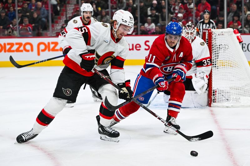 Oct 12, 2024; Montreal, Quebec, CAN; Ottawa Senators defenseman Jake Sanderson (85) controls the puck against Montreal Canadiens right wing Brendan Gallagher (11) during the first period at Bell Centre. Mandatory Credit: David Kirouac-Imagn Images