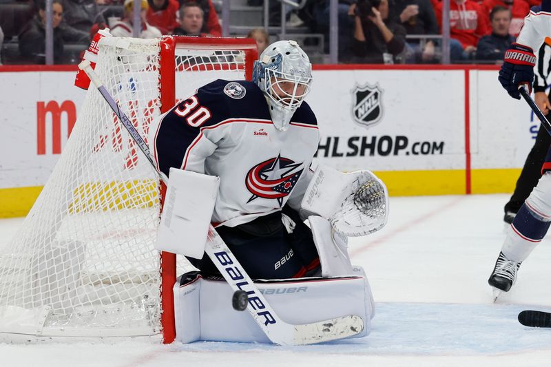 Nov 11, 2023; Detroit, Michigan, USA;  Columbus Blue Jackets goaltender Spencer Martin (30) makes a save against the Detroit Red Wings in the second period at Little Caesars Arena. Mandatory Credit: Rick Osentoski-USA TODAY Sports