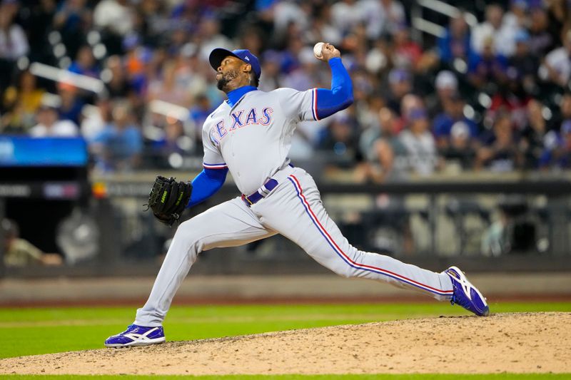 Aug 30, 2023; New York City, New York, USA; Texas Rangers pitcher Aroldis Chapman (45) delivers a pitch against the New York Mets during the tenth inning at Citi Field. Mandatory Credit: Gregory Fisher-USA TODAY Sports