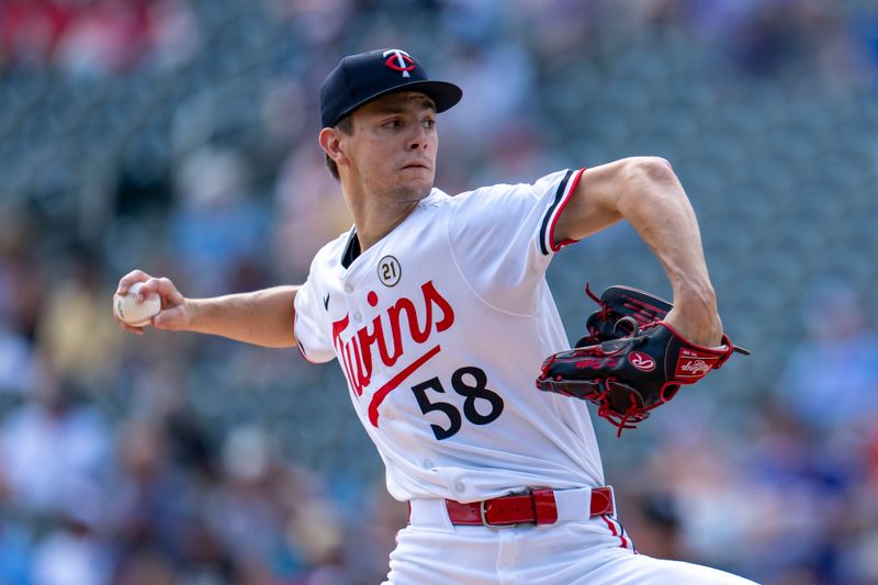 Sep 15, 2024; Minneapolis, Minnesota, USA; Minnesota Twins starting pitcher David Festa (58) delvers a pitch against the Cincinnati Reds in the first inning at Target Field. Mandatory Credit: Jesse Johnson-Imagn Images