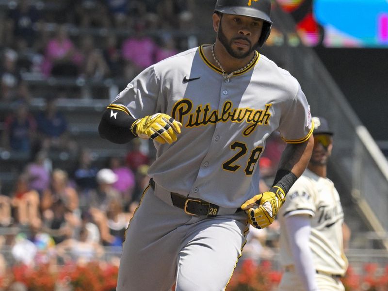 Jul 13, 2025; Minneapolis, Minnesota, USA;  Pittsburgh Pirates outfielder Tommy Pham (28) rounds the bases after hitting a solo home run against the Minnesota Twins during the second inning at Target Field. Mandatory Credit: Nick Wosika-Imagn Images