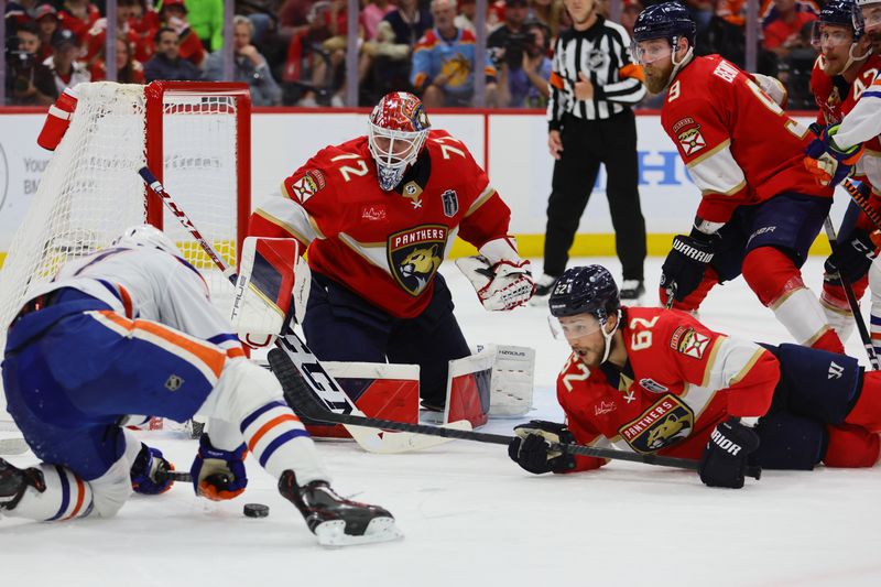 Jun 24, 2024; Sunrise, Florida, USA; Florida Panthers goaltender Sergei Bobrovsky (72) and defenseman Brandon Montour (62) defend against Edmonton Oilers during the third period in game seven of the 2024 Stanley Cup Final at Amerant Bank Arena. Mandatory Credit: Sam Navarro-USA TODAY Sports