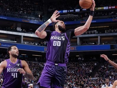 SACRAMENTO, CA - DECEMBER 23: JaVale McGee #00 of the Sacramento Kings grabs a rebound during the game against the Minnesota Timberwolves on December 23, 2023 at Golden 1 Center in Sacramento, California. NOTE TO USER: User expressly acknowledges and agrees that, by downloading and or using this Photograph, user is consenting to the terms and conditions of the Getty Images License Agreement. Mandatory Copyright Notice: Copyright 2023 NBAE (Photo by Rocky Widner/NBAE via Getty Images)