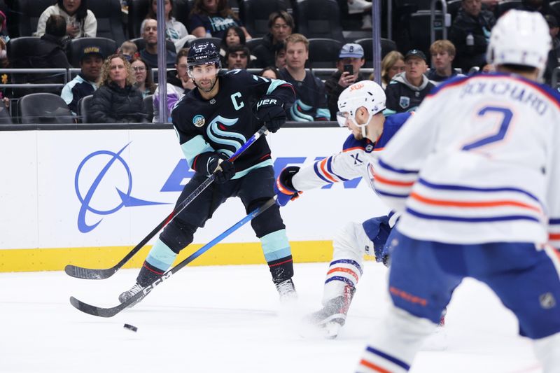 Nov 29, 2025; Seattle, Washington, USA;  Seattle Kraken right wing Jordan Eberle (7) passes in the first period against the Edmonton Oilers at Climate Pledge Arena. Mandatory Credit: Kevin Ng-Imagn Images