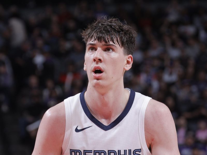 SACRAMENTO, CA - MARCH 18: Jake LaRavia #3 of the Memphis Grizzlies prepares to shoot a free throw during the game against the Sacramento Kings on March 18, 2024 at Golden 1 Center in Sacramento, California. NOTE TO USER: User expressly acknowledges and agrees that, by downloading and or using this Photograph, user is consenting to the terms and conditions of the Getty Images License Agreement. Mandatory Copyright Notice: Copyright 2024 NBAE (Photo by Rocky Widner/NBAE via Getty Images)