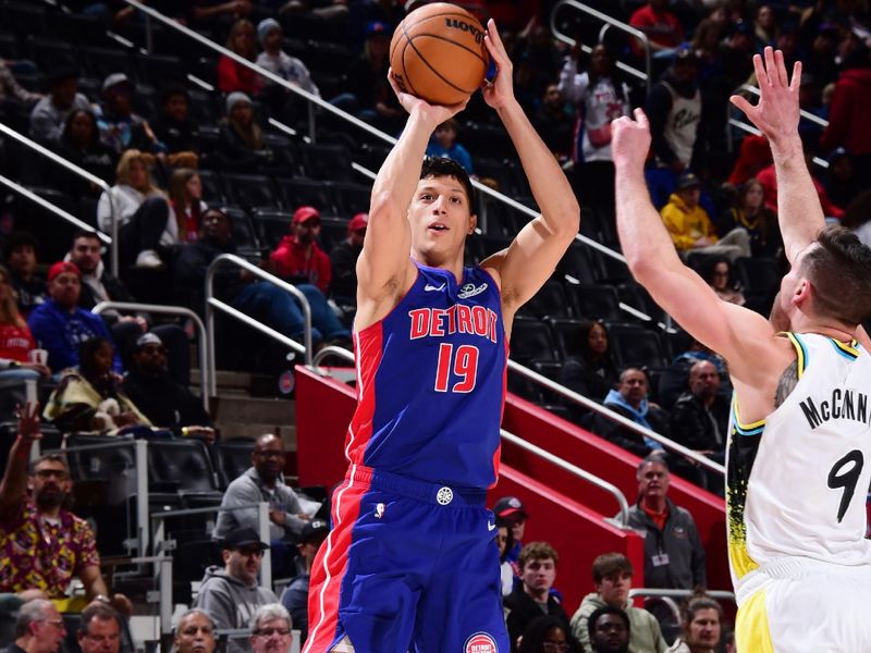 DETROIT, MI - JANUARY 16: Simone Fontecchio #19 of the Detroit Pistons shoots a three point basket during the game against the Indiana Pacers on January 16, 2025 at Little Caesars Arena in Detroit, Michigan. NOTE TO USER: User expressly acknowledges and agrees that, by downloading and/or using this photograph, User is consenting to the terms and conditions of the Getty Images License Agreement. Mandatory Copyright Notice: Copyright 2025 NBAE (Photo by Chris Schwegler/NBAE via Getty Images)