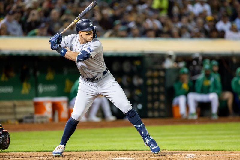 Sep 20, 2024; Oakland, California, USA; New York Yankees outfielder Aaron Judge (99) at bat during the sixth inning against the Oakland Athletics at Oakland-Alameda County Coliseum. Mandatory Credit: Bob Kupbens-Imagn Images