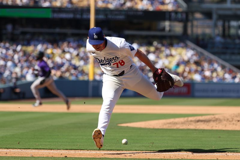 Sep 22, 2024; Los Angeles, California, USA;  Los Angeles Dodgers starting pitcher Ben Casparius (78) is unable to fields a single by Colorado Rockies shortstop Ezequiel Tovar (not pictured) during the sixth inning at Dodger Stadium. Mandatory Credit: Kiyoshi Mio-Imagn Images