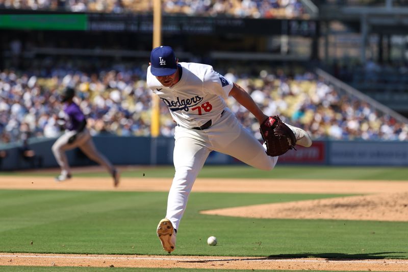 Sep 22, 2024; Los Angeles, California, USA;  Los Angeles Dodgers starting pitcher Ben Casparius (78) is unable to fields a single by Colorado Rockies shortstop Ezequiel Tovar (not pictured) during the sixth inning at Dodger Stadium. Mandatory Credit: Kiyoshi Mio-Imagn Images