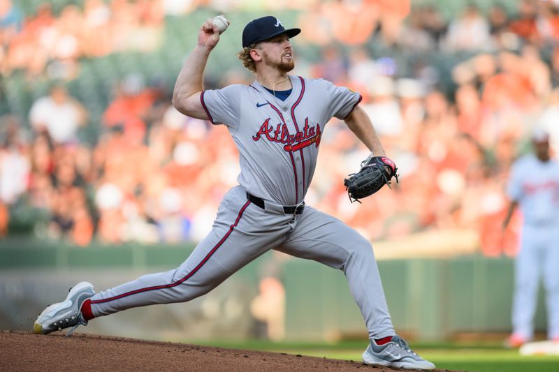 Jun 12, 2024; Baltimore, Maryland, USA; Atlanta Braves pitcher Spencer Schwellenbach (56) throws a pitch during the first inning against the Baltimore Orioles at Oriole Park at Camden Yards. Mandatory Credit: Reggie Hildred-USA TODAY Sports